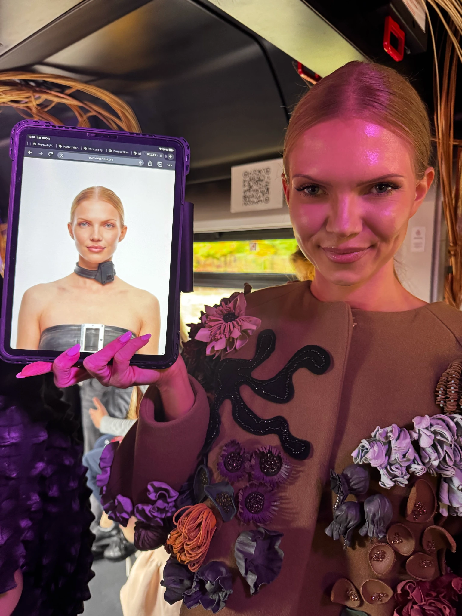 A designer look presented on board the Cultural Train alongside a WEARFITS virtual try-on visualization.
