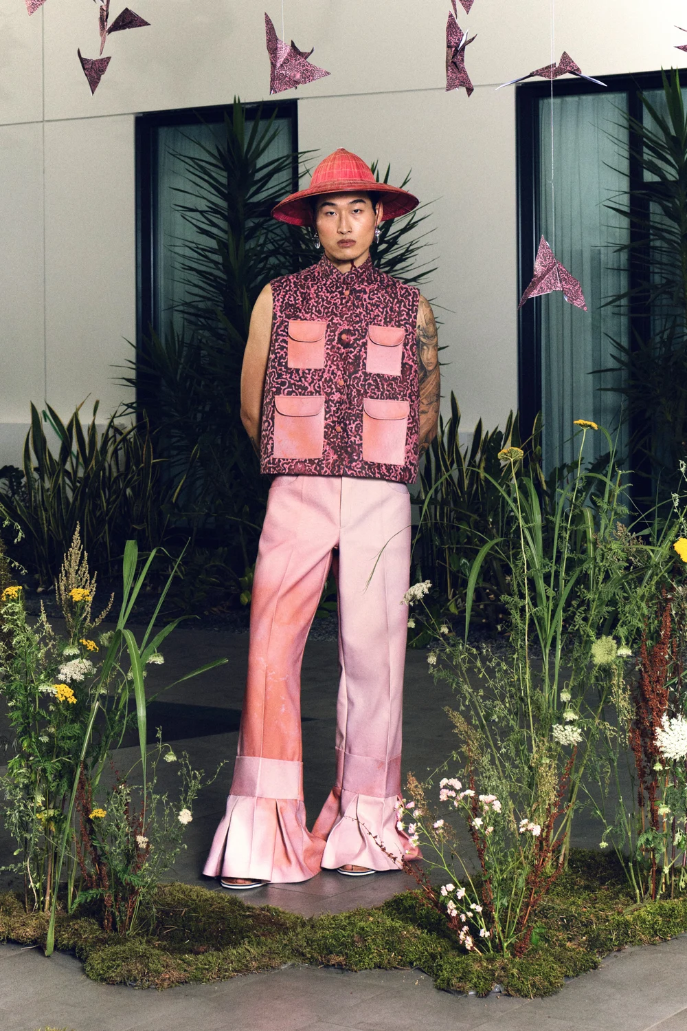 Pink patterned vest and flared trousers — design by IMPARI