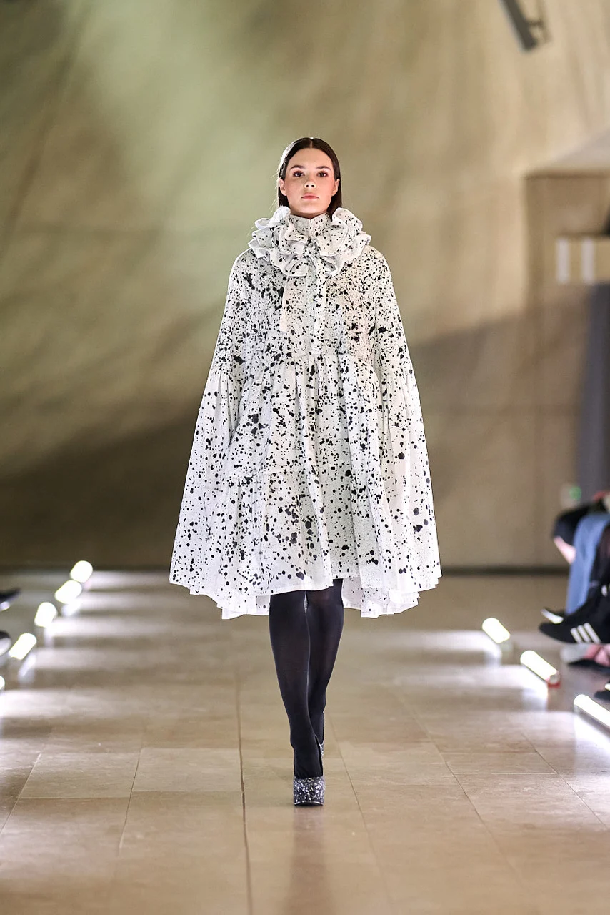 White speckled coat with a sculptural collar — design by Play Sustain — Justyna Rozek