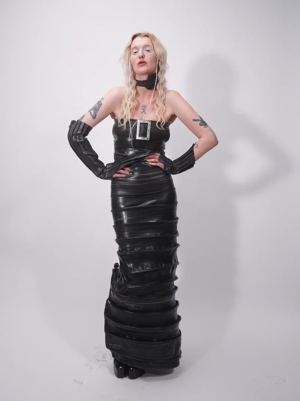 Black floor-length gown with a buckled bodice — design by SLVA